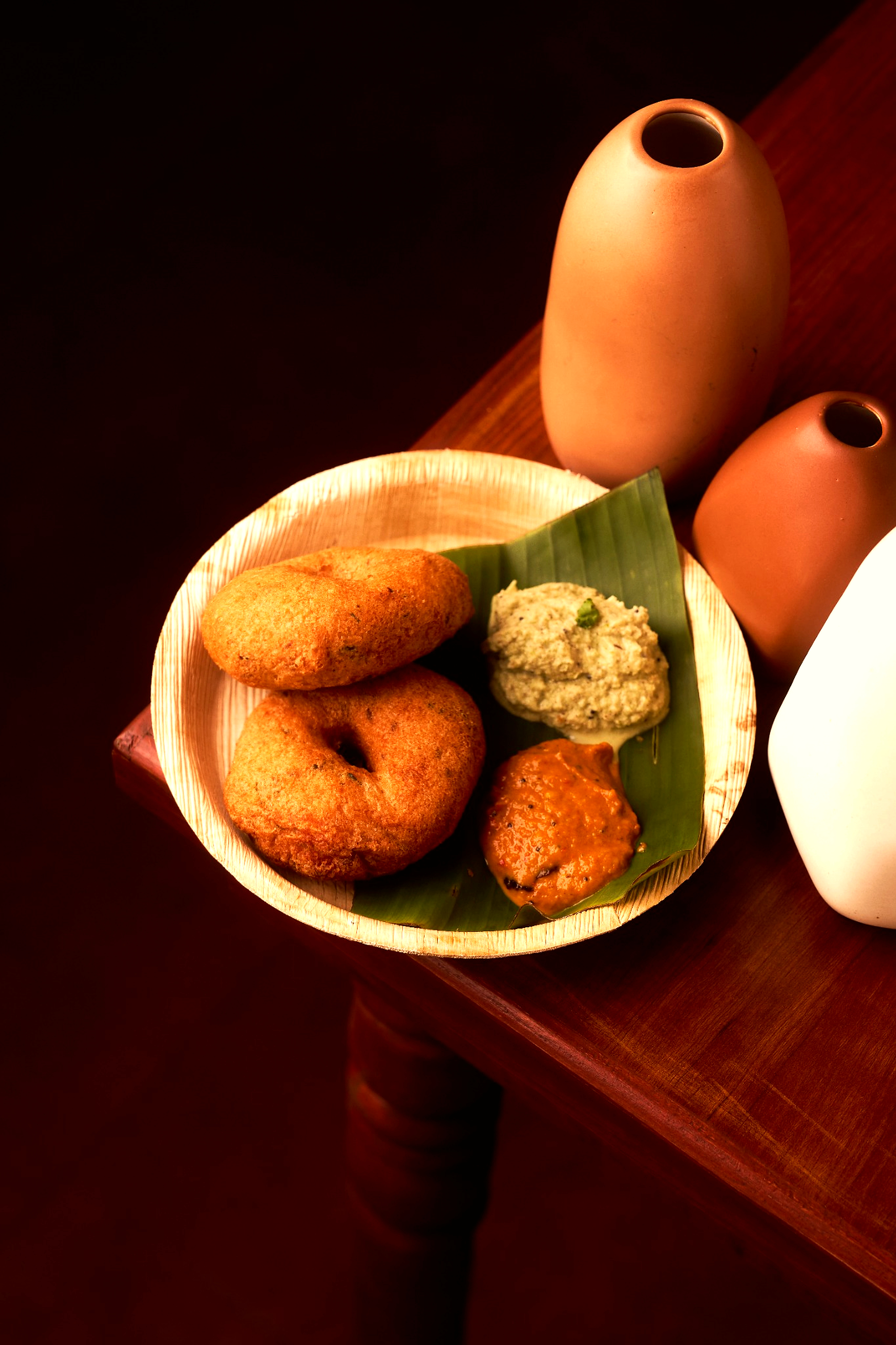 Crisp vada plated with chutneys